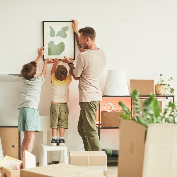 Family putting up furniture as we handle the move in/out cleaning