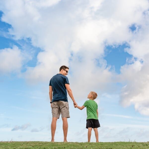 Father and son enjoying outdoors and nice blue sky while we handle the house cleaning